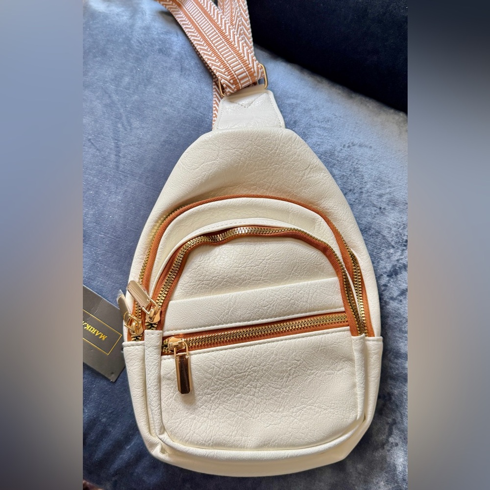 Elegant Cream and Tan Crossbody Bag with Gold Accents